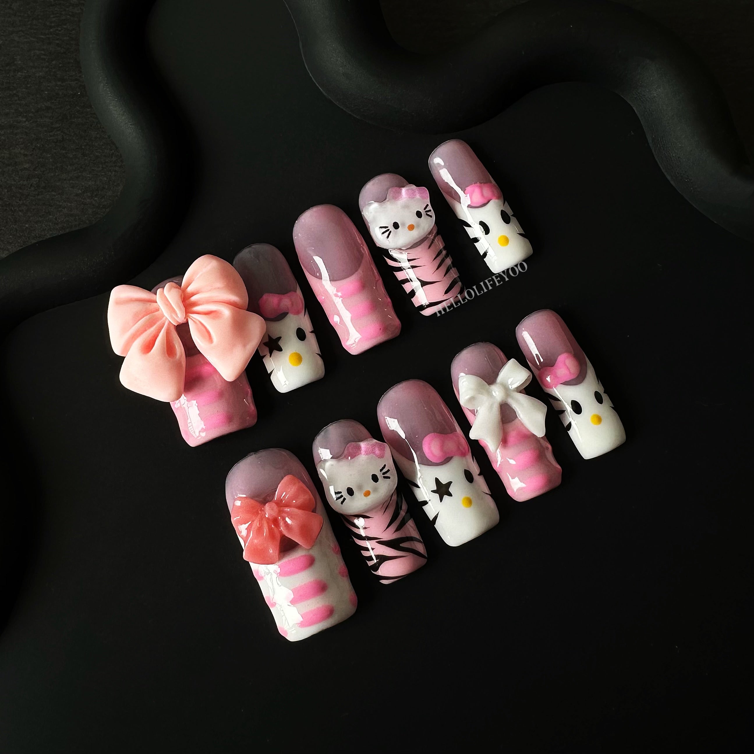 SANIO Y2K HELLO KITTY-TEN PIECES OF HANDCRAFTED PRESS ON NAIL